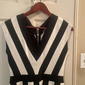 Black and white knee length dress has stretch